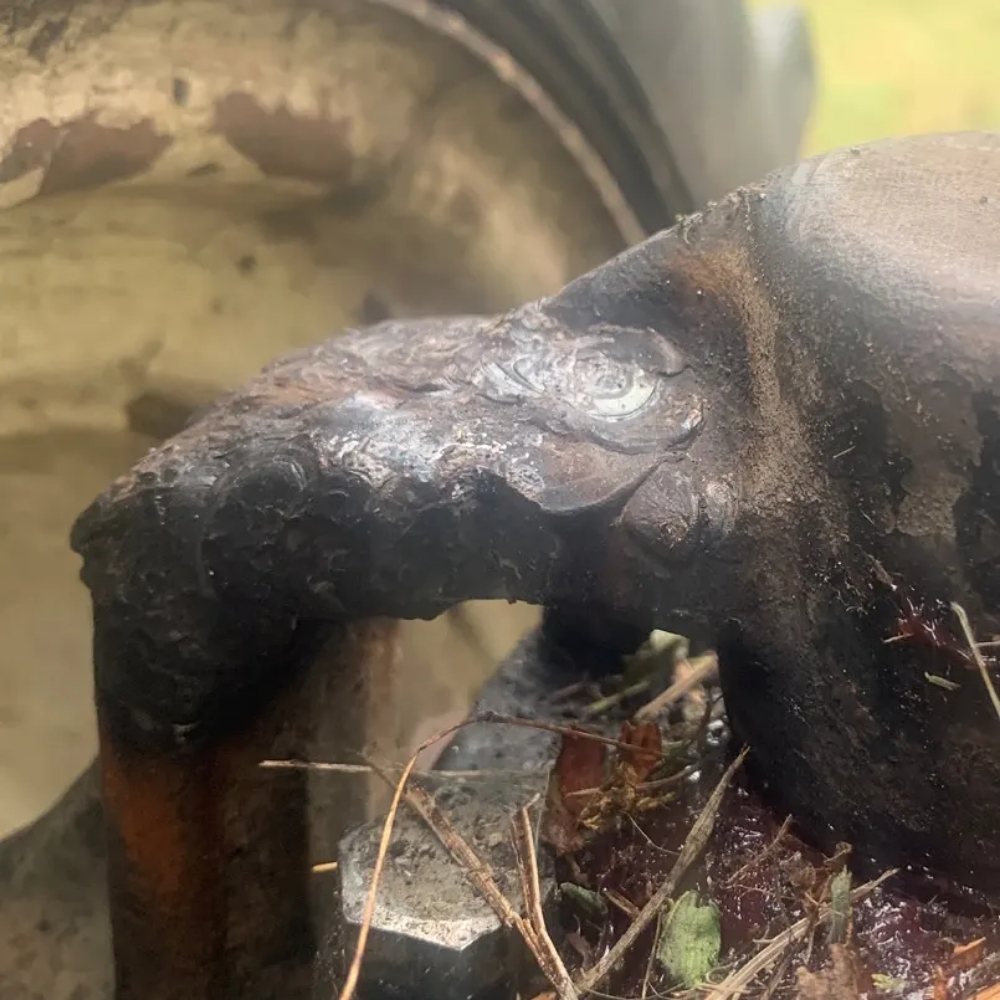 Cast steering arm repaired by welding